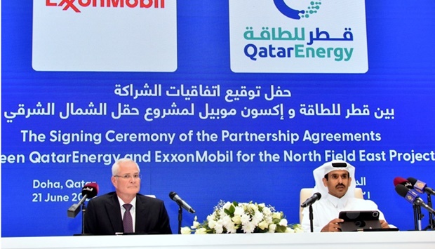 HE the Minister of State for Energy Affairs Saad Sherida al-Kaabi, also President and CEO of QatarEnergy, and Darren Woods, Chairman and CEO of ExxonMobil, at the agreement signing ceremony in Doha. PICTURE: Thajudheen.