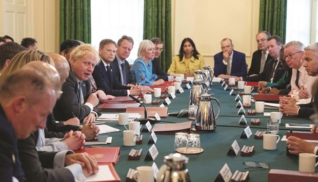 Britainu2019s Prime Minister Boris Johnson speaks at the start of a cabinet meeting in Downing Street in London yesterday. Johnson, addressing Cabinet, urged u201cthe union barons to sit down with Network Rail and the train companiesu201d to thrash out a deal.