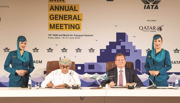 Oman Air CEO Abdulaziz al-Raisi and oneworld CEO Rob Gurney sign the agreement for Oman Air to join oneworld on the sidelines of IATA Annual General Meeting in Doha.