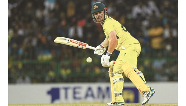 Australiau2019s Travis Head plays a shot during the fourth ODI against Sri Lanka on June  21, 2022. (AFP)