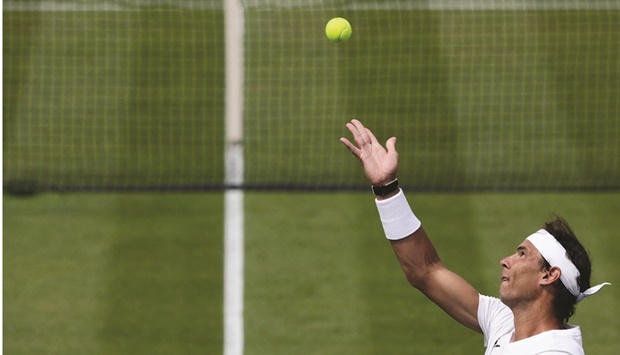 Spainu2019s Rafael Nadal serves against Canadau2019s Felix Auger-Aliassime during their exhibition match at The Giorgio Armani Tennis Classic tournament at the Hurlingham Club in London yesterday. (AFP)