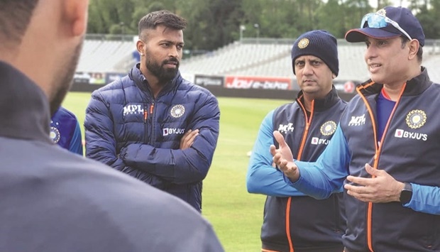 Hardik Pandya (left) and India coach VVS Laxman (right) are seen at a team training session in Dublin, Ireland, yesterday. Pandya will lead India in their two T20I against Ireland today and on Tuesday.