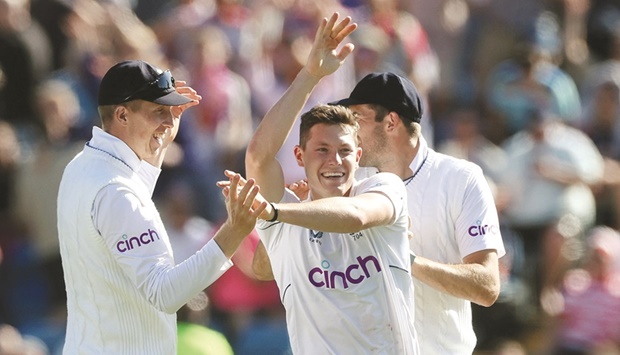 Englandu2019s Matthew Potts (centre) celebrates taking the wicket of New Zealandu2019s Kane Williamson during the third day of the third and final Test at Yorkshire Cricket Ground, Leeds, Britain, yesterday. (Reuters)