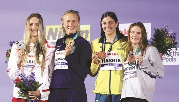 Gold-medallist Swedenu2019s Sarah Sjostrom (second from left), silver-medallist Polandu2019s Katarzyna Wasick (left) and bronze-medallists Australiau2019s Meg Harris and Erika Brown pose with their medals following the womenu2019s 50m freestyle finals during the Budapest World Aquatics Championships at Duna Arena yesterday. (Reuters)