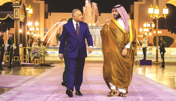 A handout picture released by the Saudi Royal Palace yesterday, shows Saudi Crown Prince Mohamed bin Salman, receiving Iraqi Prime Minister Mustafa al-Kadhimi, in the city of Jeddah.