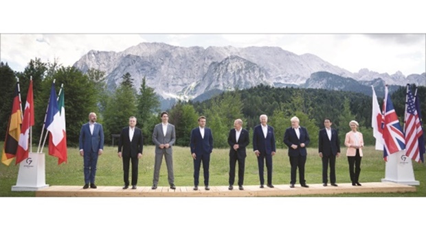 (L to R): European Council President Charles Michel, Italian Prime Minister Mario Draghi, Canadian Prime Minister Justin Trudeau, French President Emmanuel Macron, German Chancellor Olaf Scholz, US President Joe Biden, British Prime Minister Boris Johnson, Japanese Prime Minister Fumio Kishida and European Commission  President Ursula von der Leyen pose for a family photo during the G7 summit in Schloss Elmau, near Garmisch-Partenkirchen in Germany yesterday. (Reuters)