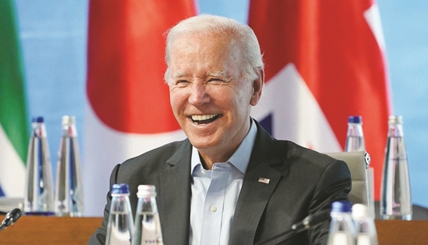 US President Joe Biden smiles as he waits for the start of a lunch with the Group of Seven leaders at the G-7 Summit in at Elmau Castle, southern Germany on Monday.