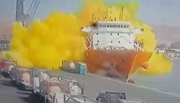 This image grab taken from a CCTV footage broadcasted by Jordan's Al-Mamlaka TV shows the moment of a toxic gas explosion in Jordan's Aqaba port. AFP/AL MAMLAKA TV