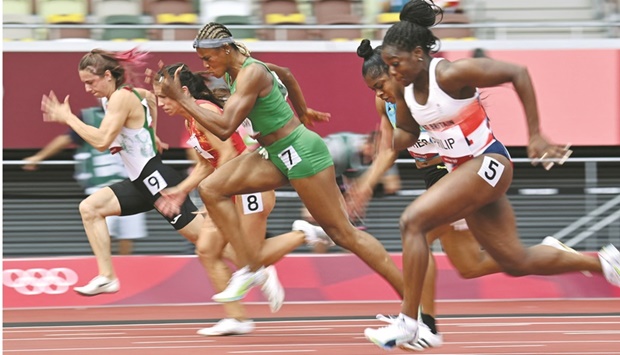 In this file photograph taken on July 30, 2021, Nigeriau2019s Blessing Okagbare (7), Britainu2019s Asha Philip (5) and Belarusu2019 Krystsina Tsimanouskaya (9), compete in the womenu2019s 100m heats during the Tokyo 2020 Olympic Games at the Olympic Stadium in Tokyo. The Athletics Integrity Unit (AIU) announced yesterday that sprinter Okagbare has had her anti-doping suspension raised from 10 to 11 years because of a new element in her case, which also deprives the Nigerian womenu2019s 4x100m relay team a chance to compete in the World Championships in Eugene. (AFP)