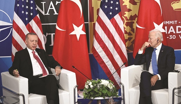 US President Joe Biden (right) listens to Turkish President Recep Tayyip Erdogan during a bilateral meeting on the sidelines of the Nato summit at the Ifema Congress Centre in Madrid yesterday. (AFP)