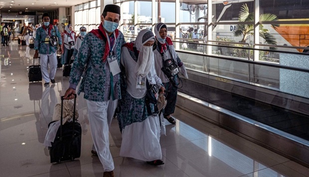 Indonesian pilgrims prepare to depart to Makkah in Saudi Arabia from Juanda International Airport in Surabaya, Saturday
