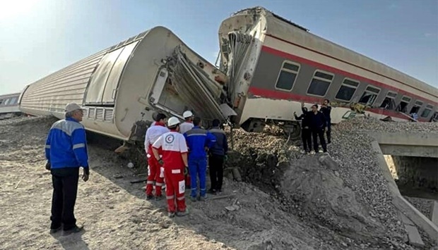 Rescuers at the scene of a train derailment near the central Iranian city of Tabas on the line between the Iranian cities of Mashhad and Yazd. AFP