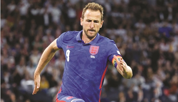 Englandu2019s forward Harry Kane celebrates after scoring the equalising goal during the UEFA Nations League match against Germany in Munich. (AFP)