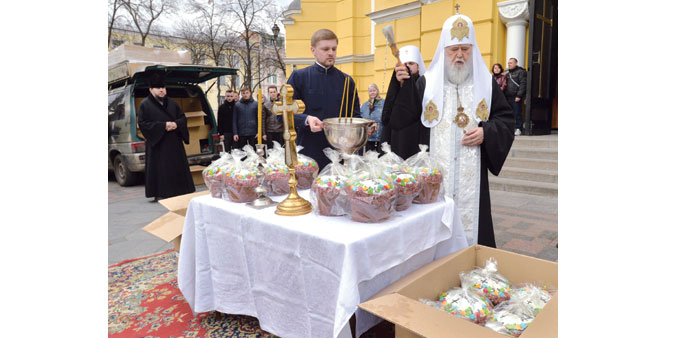 Patriarch of the Ukrainian Orthodox church Filaret blesses traditional Easter cakes in Kiev.