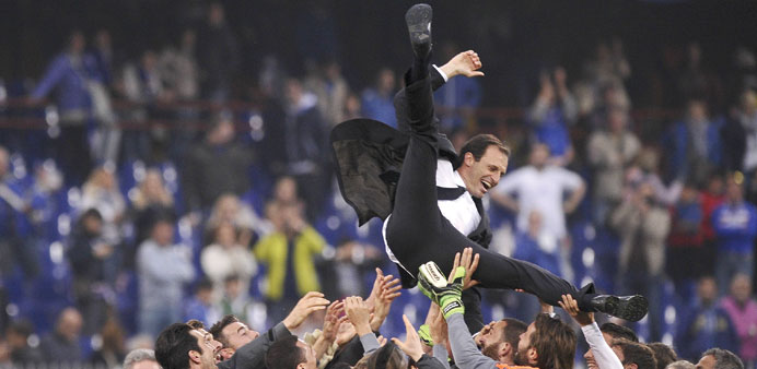 Juventusu2019 coach Massimiliano Allegri is thrown in the air by his players at the end of their Serie A match against Sampdoria.