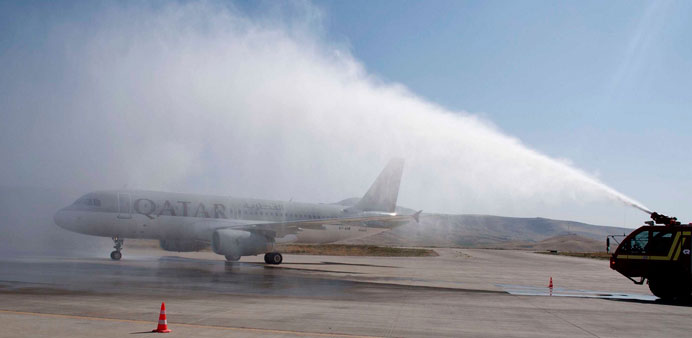 The maiden Qatar Airways flight being welcomed with a water salute at Sulaymaniyah International Airport.