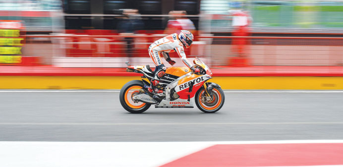 Hondau2019s Spanish rider Marc Marquez leaves the pit during the free practice ahead of the Italian Moto GP in Mugello yesterday. (AFP)