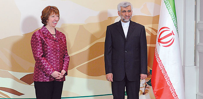Ashton and Jalili pose for a photo while meeting on the sidelines of the talks in Almaty yesterday.