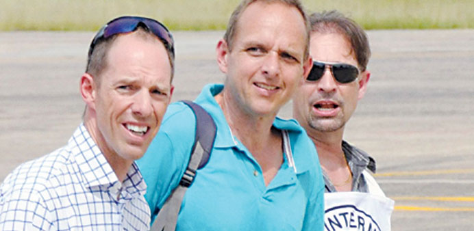 Canadian geologist Jernoc Wobert (second right) arrives after being released by Colombian ELN rebels in Barrancabermeja, northwestern Colombia.