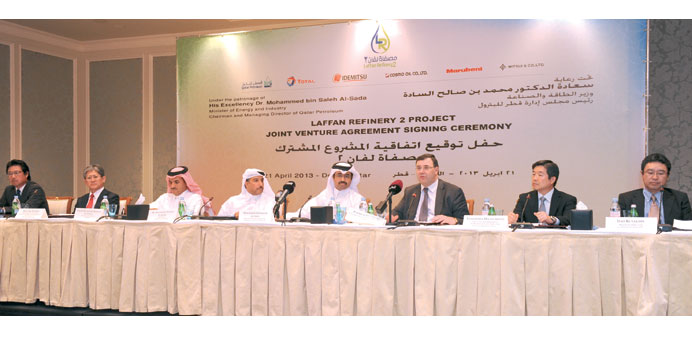 HE the Minister of Energy and Industry Dr Mohamed bin Saleh al-Sada  with representatives of joint-venture partners of the new refinery