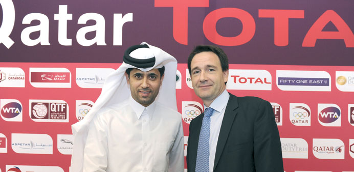 Qatar Tennis Federation president Nasser Ghanim al-Khelaifi with Stephane Michel, Managing Director of Total E&P Qatar.