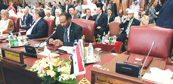 Somalian Foreign Minister Abdirahman Udale Bayle sits next to empty Syrian seat at the opening session of the Arab League foreign ministersu2019 meeting i