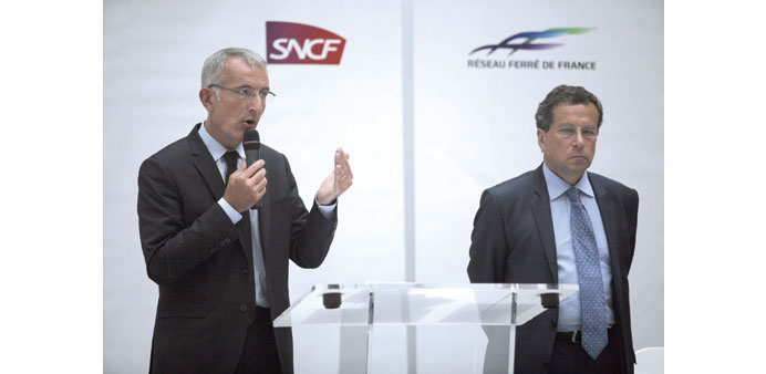 SNCF chairman Guillaume Pepy (left) speaks beside RFF head Jacques Rapoport during a press conference yesterday in Paris.