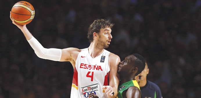 Spainu2019s Pau Gasol (left) in action against Ibrahima Thomas, of Senegal, during the FIBA Basketball World Cup round of 16 match.