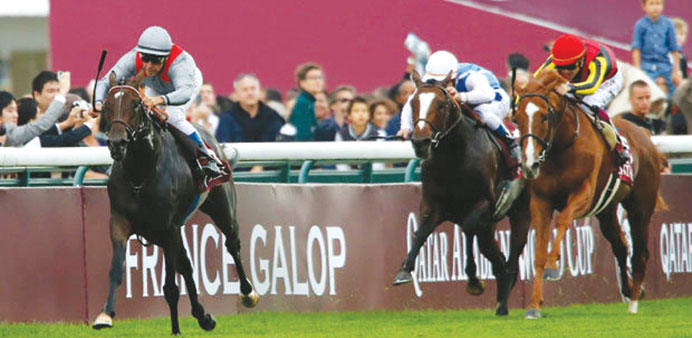 Treve (Thierry Jarnet astride) goes clear to win the Qatar Prix de lu2019Arc de Triomphe at the Longchamp racecourse in Paris in October ,2013.