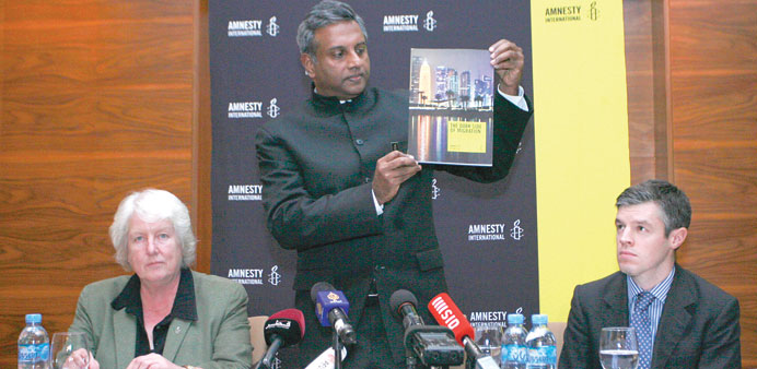 Amnesty International secretary-general Salil Shetty launching the report in Doha yesterday. PICTURES: Najeer Feroke