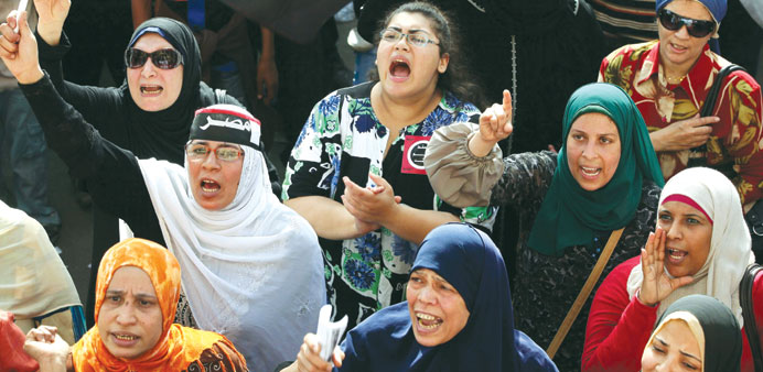 Female protesters shout anti-Mursi slogans in Cairou2019s Tahrir Square yesterday.