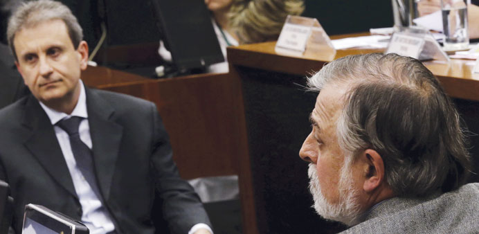 Former Petrobras executive Paulo Roberto Costa (right) and businessman Alberto Youssef participate in a session of a parliamentary commission investig