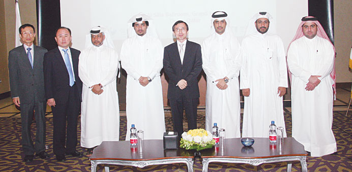 South Korean and Qatari officials at the forum yesterday.