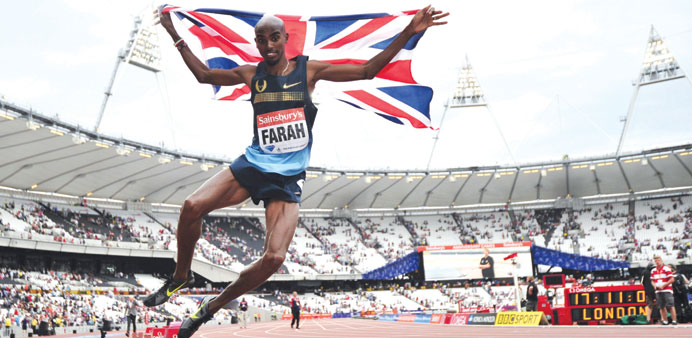 Mo Farah of Britain celebrates his win in the 3,000m at the London Diamond League. (AFP)