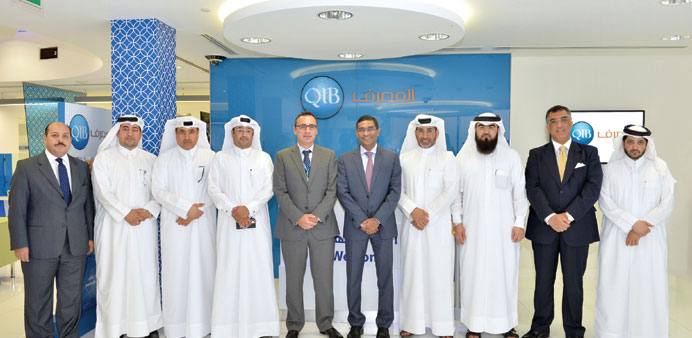 QIB officials during the recent opening of The Gate Mall branch.