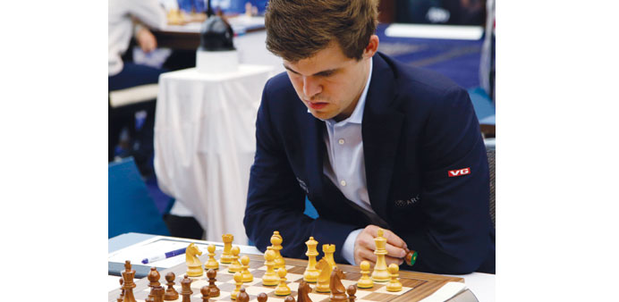 Magnus Carlsen beat GM Li Chao to move clear of the field in Qatar.