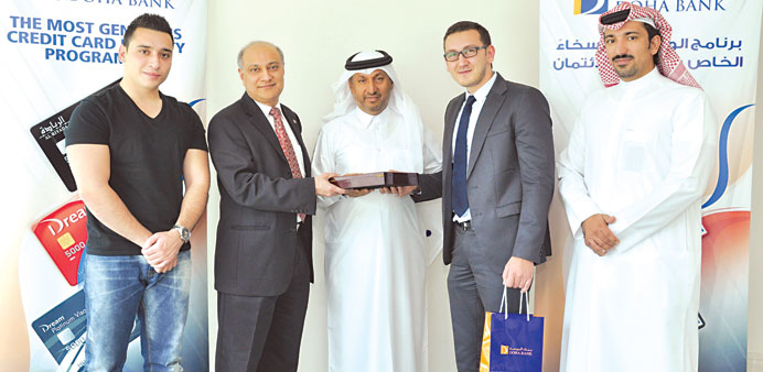 A special ceremony was held at the Doha Bank headquarters to congratulate the customer and merchant partner.