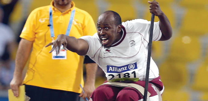 Qataru2019s Abdelrahman Abdelqader competes in the menu2019s shot put F34 final during the IPC Athletics World Championships.
