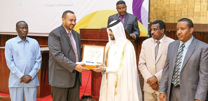 Raed al-Emadi with Sudanese dignitaries at the ceremony.