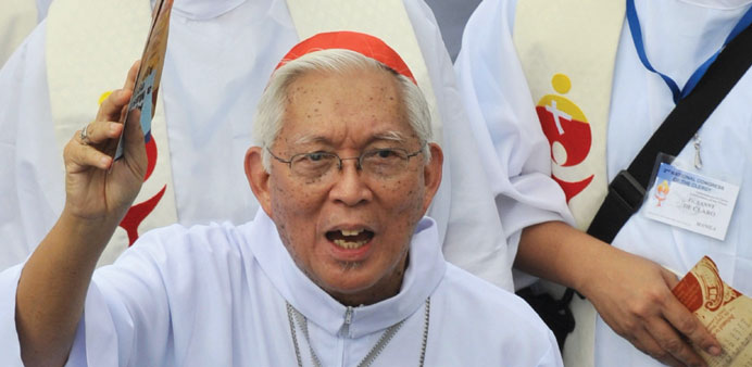 Elderly Catholic cardinal Gaudencio Rosales took over a typhoon-lashed Philippine highway and single-handedly untangled a mammoth traffic jam the like
