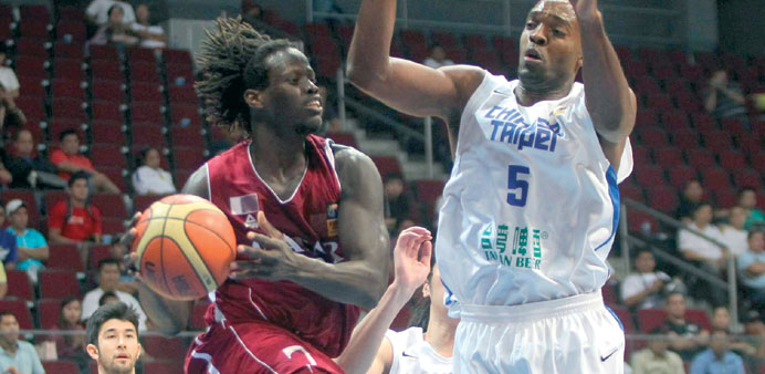Action from the Qatar-Chinese Taipei game in Manila yesterday.