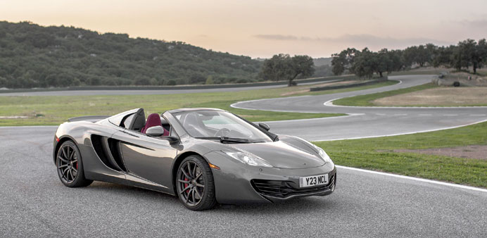 The 2014 McLaren 12C Spider is the convertible version of the fixed-roof 12C coupe. 