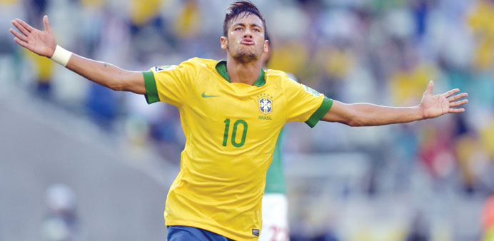 Brazilu2019s forward Neymar celebrates after scoring against Mexico during their FIFA Confederations Cup Group A match at the Castelao Stadium in Fortalez