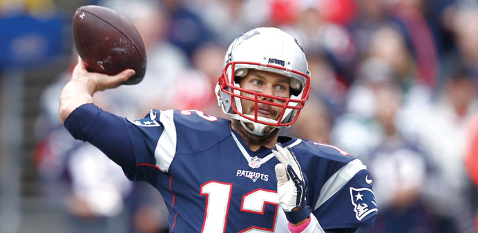 New England Patriots quarterback Tom Brady throws a pass against the New York Jets during the first half at Gillette Stadium.