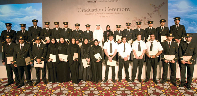 The graduates with the Qatar Airways CEO.
