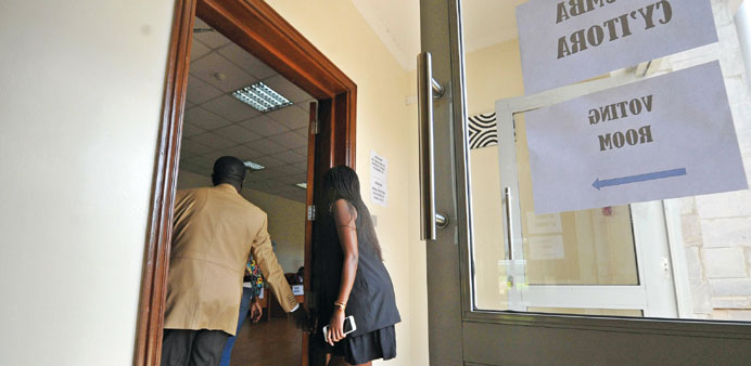 Voters arrive at a polling station at the Rwandan High Commission in Nairobi yesterday.  