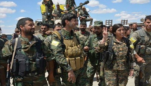 IS forces are currently under siege in the Syrian town of Minbej, which lies on their main supply route between Syria and Turkey. Picture: Members of Syrian Democratic Forces at Manbij