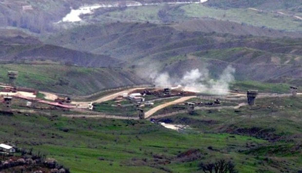 Smoke rising after a roadside bomb tore through a military vehicle in Hakkari province.