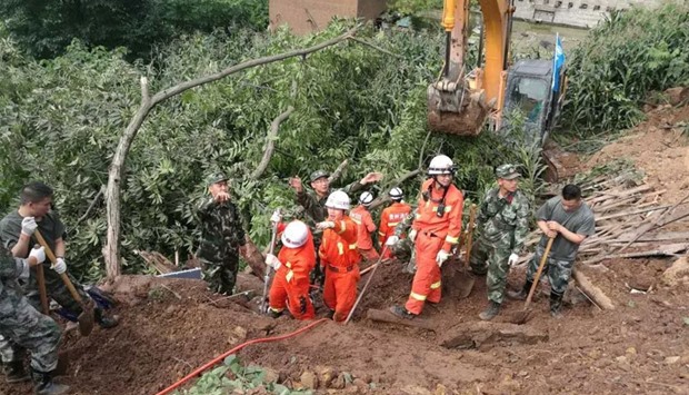 Search and rescue operations go on at Pianpo. Twitter picture by Peopleu2019s Daily, China