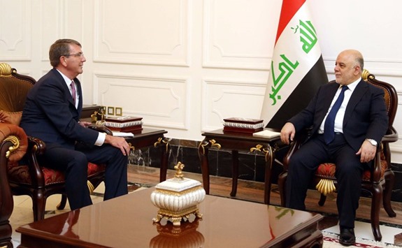 Iraqi Prime Minister Haidar al-Abadi meeting with US Pentagon chief Ashton Carter in Baghdad yesterday.  Carter held talks in the Iraqi capital on the fight against the Islamic State group and the strategy to recapture Iraqu2019s second city Mosul from the militants.